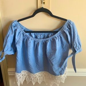 Blue top with pattern at bottom